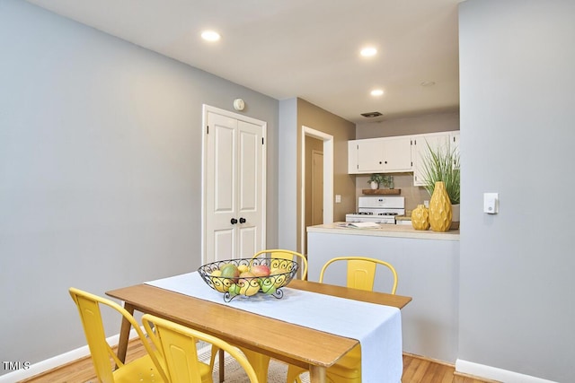 903 W Maynard Ave, Durham, NC 27704 - dining area with light wood-style floors and recessed lighting