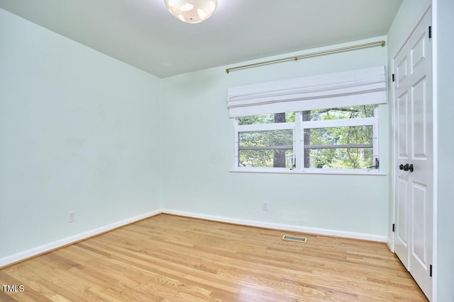 903 W Maynard Ave, Durham, NC 27704 - empty room featuring light wood-style flooring
