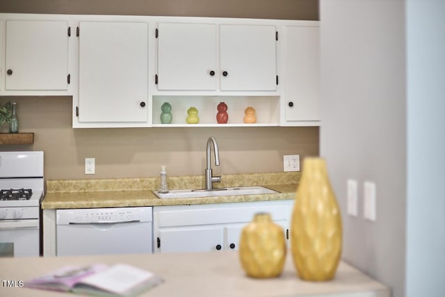 903 W Maynard Ave, Durham, NC 27704 - kitchen featuring white appliances, white cabinetry, open shelves, and light countertops