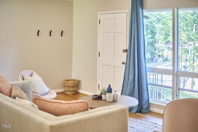 903 W Maynard Ave, Durham, NC 27704 - living area featuring wood finished floors and baseboards