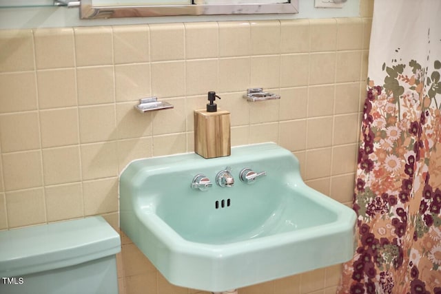 903 W Maynard Ave, Durham, NC 27704 - full bath with tile walls and a shower with curtain