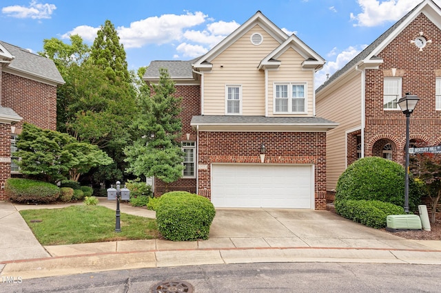 3928 Bentley Bridge Rd, Raleigh, NC 27612 - traditional-style house with driveway, a garage, and brick siding