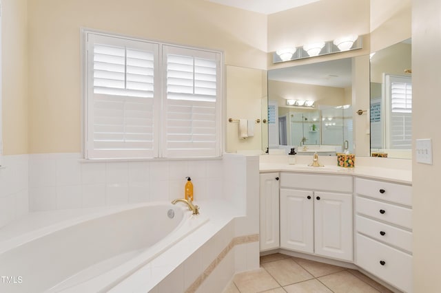 3928 Bentley Bridge Rd, Raleigh, NC 27612 - bathroom with a garden tub, vanity, tile patterned floors, and an enclosed shower