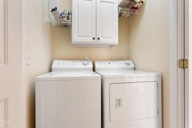 3928 Bentley Bridge Rd, Raleigh, NC 27612 - laundry area featuring cabinet space and washer and dryer