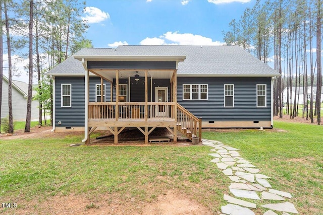 210 Sorrel Dr, Franklinton, NC 27525 - back of house featuring crawl space, a lawn, a deck, and roof with shingles