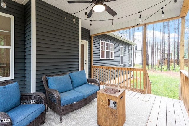210 Sorrel Dr, Franklinton, NC 27525 - deck with ceiling fan, an outdoor hangout area, and a lawn
