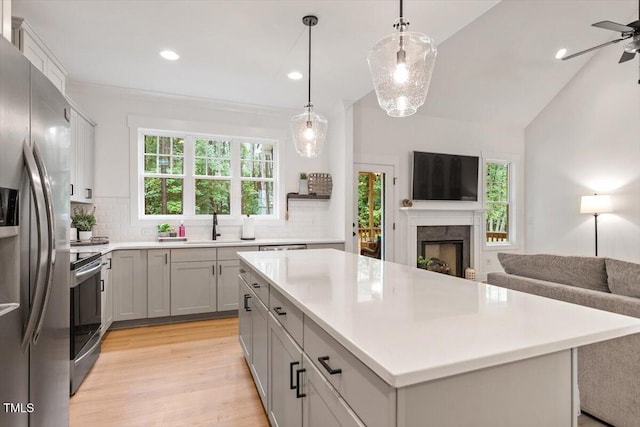 210 Sorrel Dr, Franklinton, NC 27525 - kitchen featuring open floor plan, stainless steel appliances, backsplash, plenty of natural light, and recessed lighting