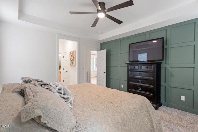 210 Sorrel Dr, Franklinton, NC 27525 - carpeted bedroom featuring a decorative wall and ceiling fan