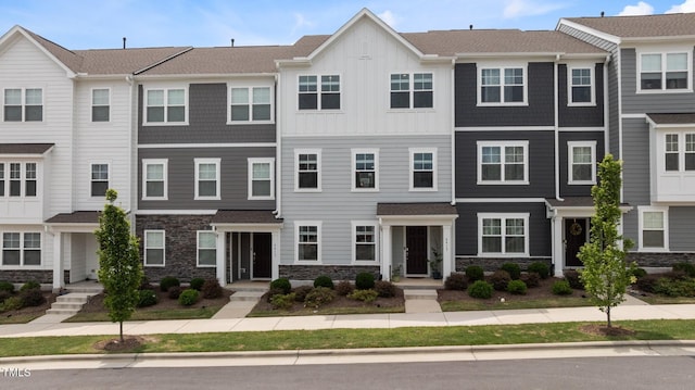 6415 Mentor Pl, Raleigh, NC 27616 - view of property with stone siding and board and batten siding