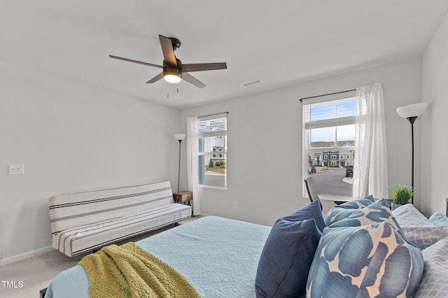 6415 Mentor Pl, Raleigh, NC 27616 - bedroom with multiple windows, carpet, ceiling fan, and baseboards
