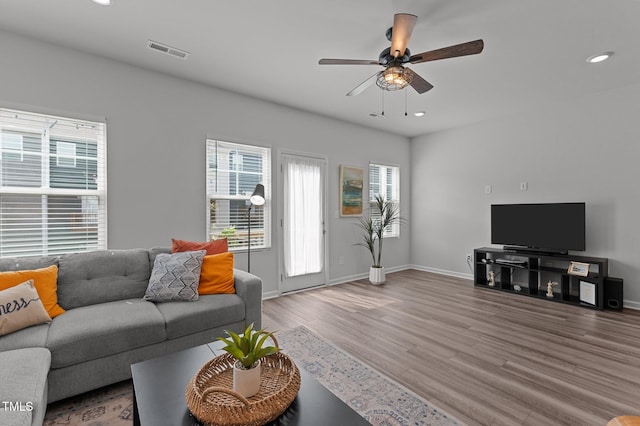 6415 Mentor Pl, Raleigh, NC 27616 - living area featuring wood finished floors, a ceiling fan, recessed lighting, and baseboards