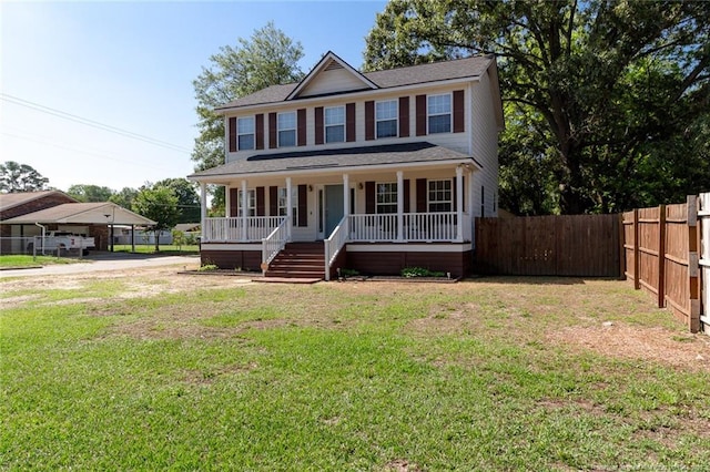 526 E Stack St, Saint Pauls, NC 28384 - colonial-style house featuring a porch