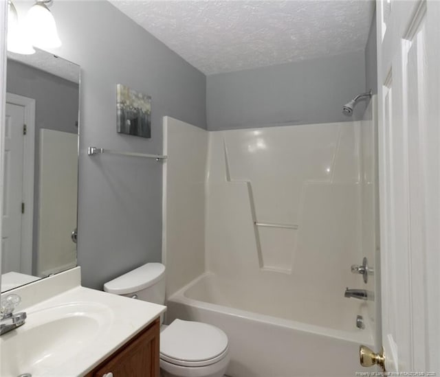 526 E Stack St, Saint Pauls, NC 28384 - full bath featuring toilet, a textured ceiling, vanity, and shower / washtub combination