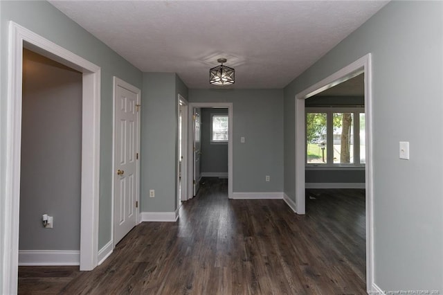 526 E Stack St, Saint Pauls, NC 28384 - hall featuring baseboards and dark wood-type flooring