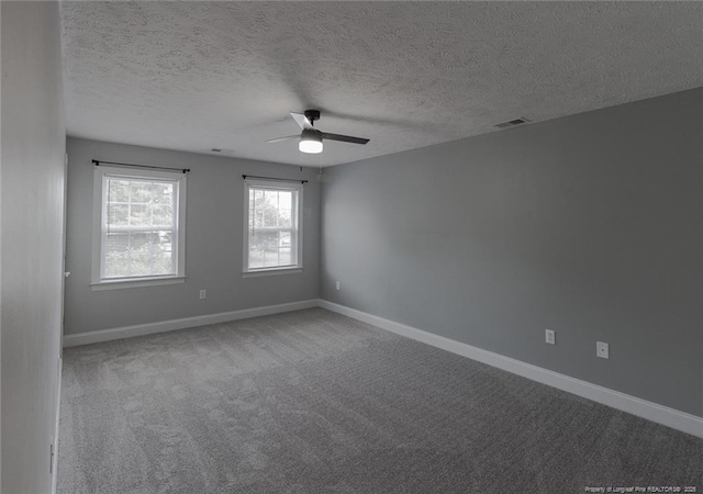 526 E Stack St, Saint Pauls, NC 28384 - carpeted spare room with ceiling fan, a textured ceiling, and baseboards