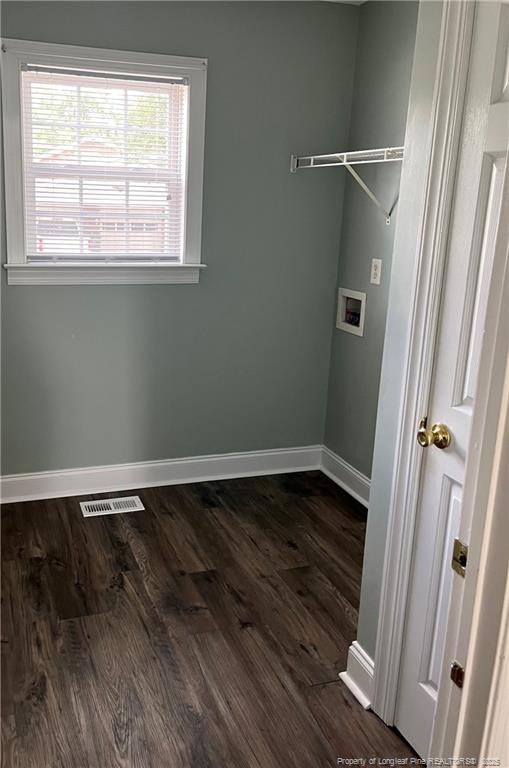 526 E Stack St, Saint Pauls, NC 28384 - washroom featuring washer hookup and dark wood-type flooring