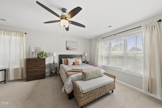 9212 Sayornis Ct, Raleigh, NC 27615 - carpeted bedroom with baseboards and ceiling fan
