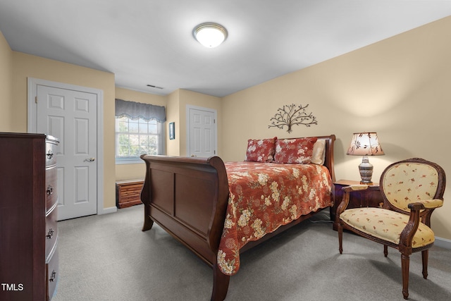 2127 Somers Ave, Burlington, NC 27215 - carpeted bedroom with baseboards