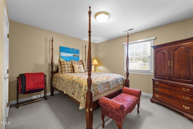 2127 Somers Ave, Burlington, NC 27215 - bedroom with light colored carpet and baseboards