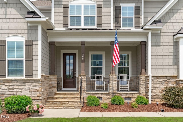 200 Baskerville Ct, Holly Springs, NC 27540 - entrance to property with stone siding and covered porch