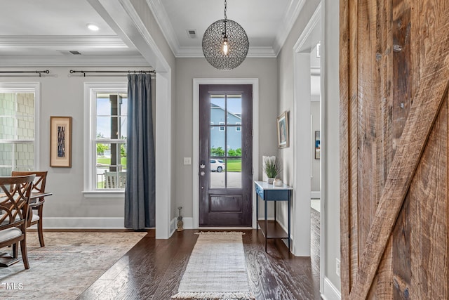 200 Baskerville Ct, Holly Springs, NC 27540 - entryway with dark wood-type flooring and crown molding