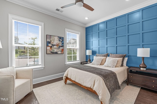 200 Baskerville Ct, Holly Springs, NC 27540 - bedroom featuring crown molding, a decorative wall, dark wood-style flooring, recessed lighting, and a ceiling fan