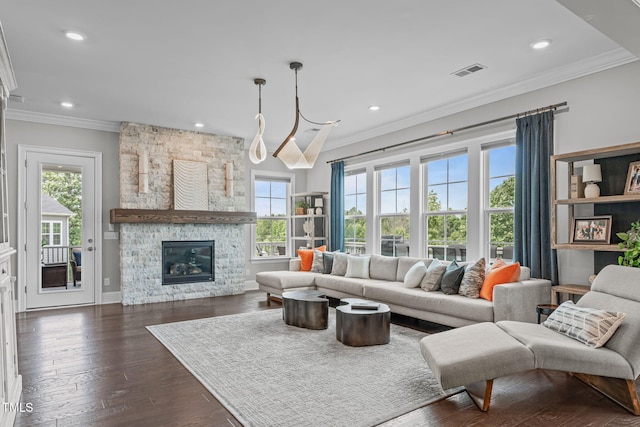 200 Baskerville Ct, Holly Springs, NC 27540 - living room featuring ornamental molding, plenty of natural light, recessed lighting, a fireplace, and dark wood-style floors