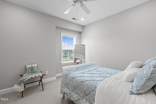 200 Baskerville Ct, Holly Springs, NC 27540 - carpeted bedroom with baseboards and a ceiling fan