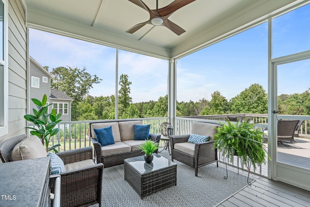 200 Baskerville Ct, Holly Springs, NC 27540 - sunroom / solarium featuring a ceiling fan, an outdoor hangout area, and plenty of natural light