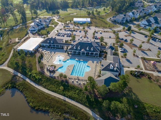 200 Baskerville Ct, Holly Springs, NC 27540 - aerial view of property and surrounding area with a pool and a nearby body of water