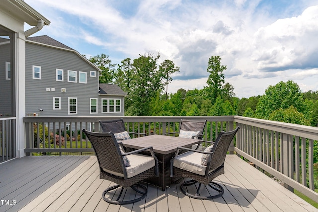 200 Baskerville Ct, Holly Springs, NC 27540 - wooden terrace with outdoor dining area