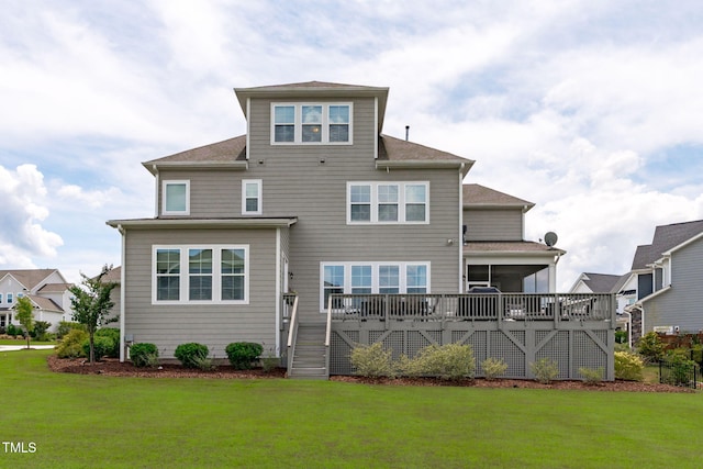 200 Baskerville Ct, Holly Springs, NC 27540 - rear view of property featuring a wooden deck, a lawn, and roof with shingles