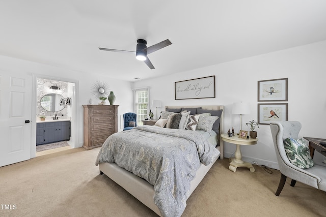 6 W Canterbury Ct, Wendell, NC 27591 - bedroom with light colored carpet, ensuite bath, ceiling fan, and a sink