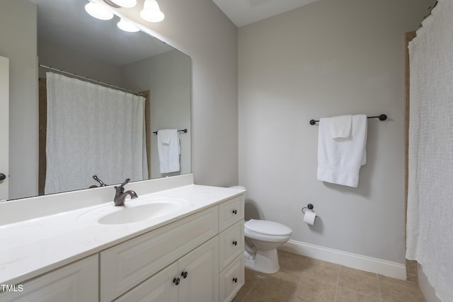 441 Heritage Village Ln, Apex, NC 27502 - full bath featuring vanity, toilet, tile patterned flooring, baseboards, and a shower with shower curtain