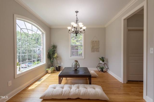 441 Heritage Village Ln, Apex, NC 27502 - dining space featuring a chandelier, wood finished floors, ornamental molding, and baseboards