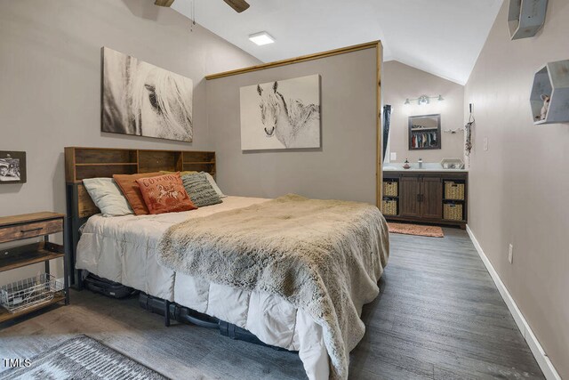 1315 Bull St, Garland, NC 28441 - bedroom with vaulted ceiling, wood finished floors, connected bathroom, baseboards, and ceiling fan