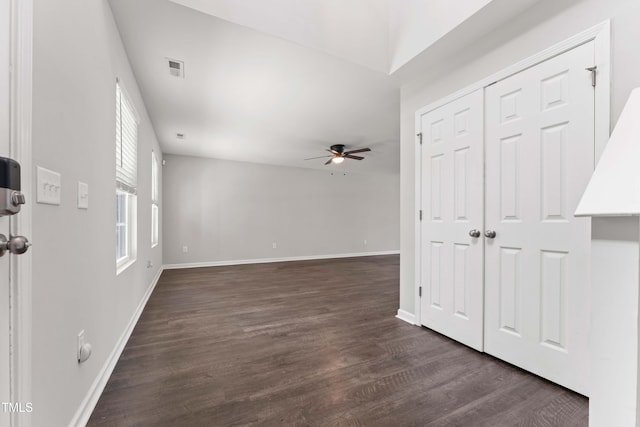 218 Mason Rd, Durham, NC 27712 - entrance foyer with ceiling fan, dark wood-type flooring, and baseboards