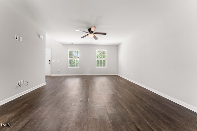 218 Mason Rd, Durham, NC 27712 - unfurnished room featuring ceiling fan, baseboards, and dark wood finished floors