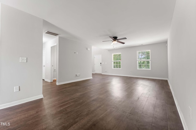 218 Mason Rd, Durham, NC 27712 - unfurnished room with a ceiling fan, dark wood-type flooring, and baseboards