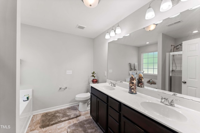218 Mason Rd, Durham, NC 27712 - full bath featuring double vanity, baseboards, a shower with door, toilet, and a garden tub