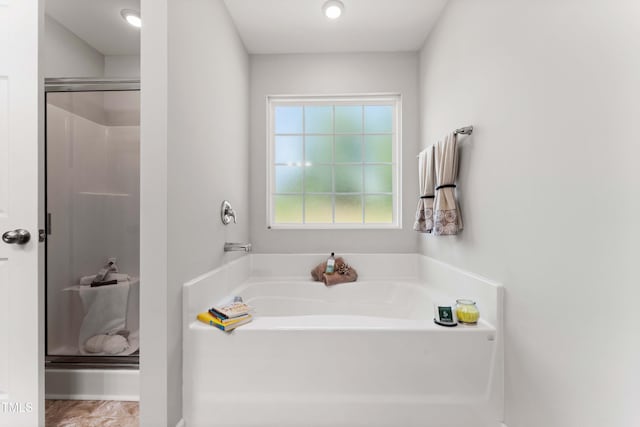 218 Mason Rd, Durham, NC 27712 - bathroom with a shower stall and a bath