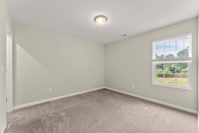 218 Mason Rd, Durham, NC 27712 - spare room featuring carpet floors and baseboards