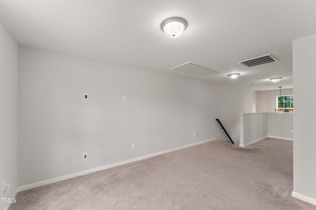 218 Mason Rd, Durham, NC 27712 - unfurnished room with attic access, carpet flooring, and baseboards