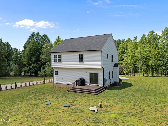 412 Carr Store Rd, Cedar Grove, NC 27231 - back of property with a lawn, crawl space, a wooden deck, central AC, and roof with shingles