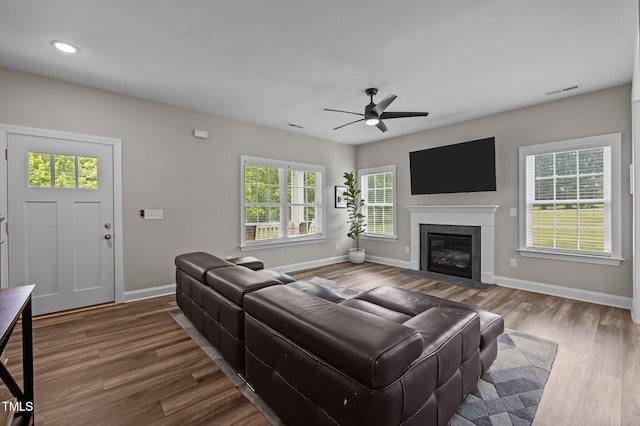 412 Carr Store Rd, Cedar Grove, NC 27231 - living room featuring baseboards, wood finished floors, healthy amount of natural light, a ceiling fan, and recessed lighting