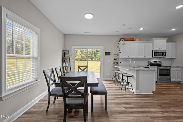 412 Carr Store Rd, Cedar Grove, NC 27231 - dining area featuring dark wood-type flooring, baseboards, and recessed lighting