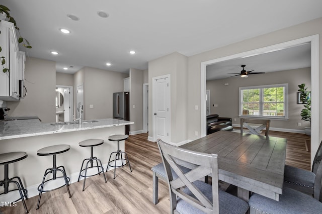 412 Carr Store Rd, Cedar Grove, NC 27231 - dining room with light wood-type flooring, baseboards, a ceiling fan, and recessed lighting
