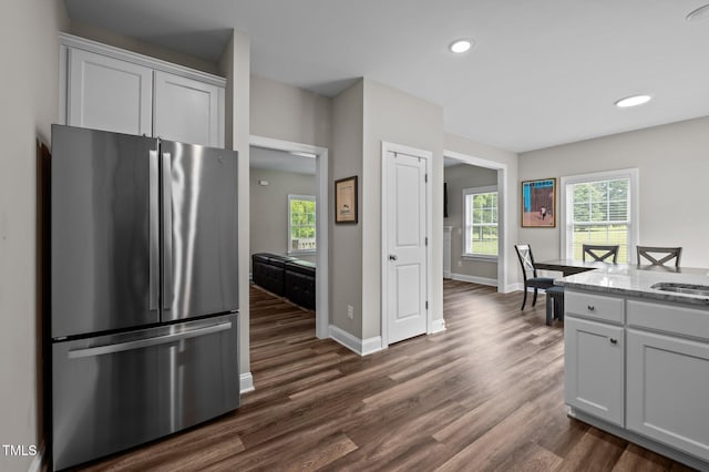412 Carr Store Rd, Cedar Grove, NC 27231 - kitchen featuring freestanding refrigerator, dark wood finished floors, baseboards, light stone counters, and recessed lighting