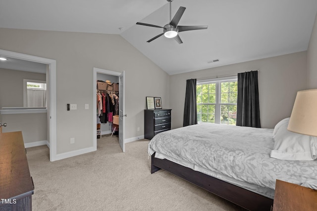 412 Carr Store Rd, Cedar Grove, NC 27231 - carpeted bedroom featuring lofted ceiling, a walk in closet, baseboards, a closet, and ceiling fan