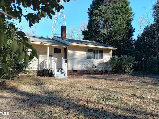 912 Dixie Trl, Raleigh, NC 27607 - view of front of property with a chimney and crawl space